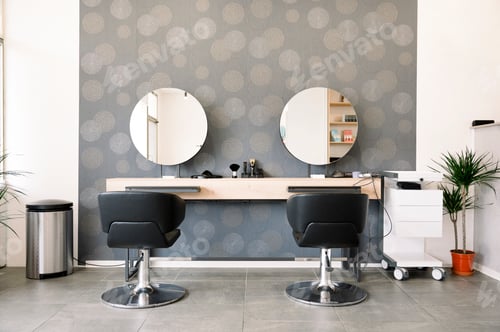 Preview: A hair salon with two chairs and two mirrors