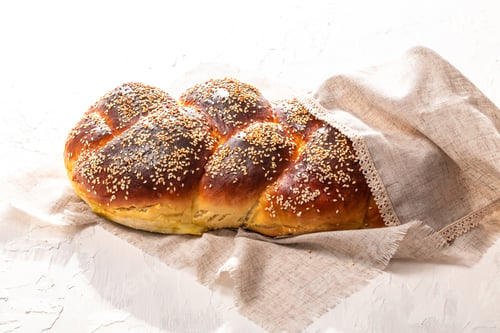 Preview: fresh challah jewish bread with sesame for Shabbat