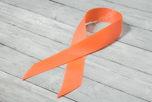 Preview: Orange ribbon on wooden background