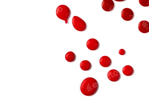 Preview: Drops of spilled nail polish over white background