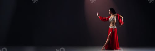 Preview: Belly Dancer in Red Costume Wide Banner with Copy Space