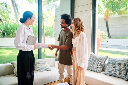 Preview: Young couple with a real estate agent