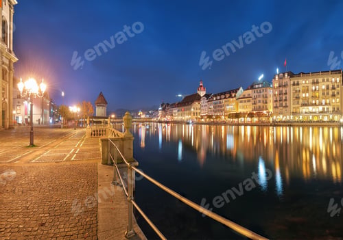 Preview: Beautiful historic city center of Lucerne with famous buildings and promanade during night..