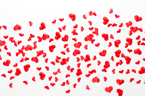 Preview: Valentines day background red hearts on wooden background.