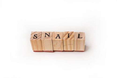 Preview: Closeup shot of the word snail on the wooden cubes