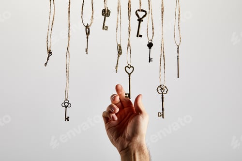 Preview: top view of vintage rusty keys on white background