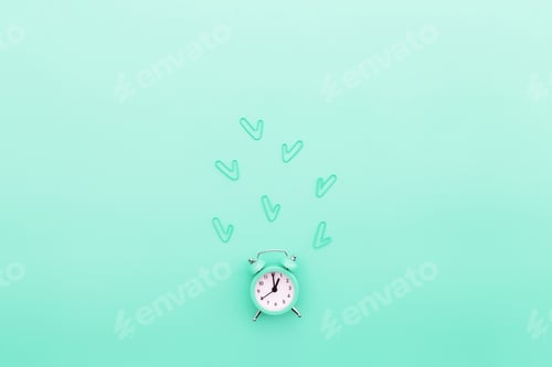 Preview: Back to school or office work conceptual flat lay with alarm clock and clips