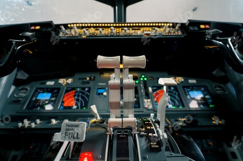 Preview: thrust lever in the cockpit of an airplane a close-up view of a flight on an aircraft simulator