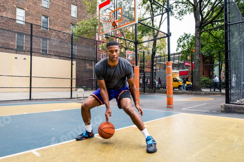 Preview: Basketball player training outdoors