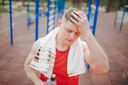 Preview: Sweating Guy Running Up Steep Hill During Outdoor Training Session