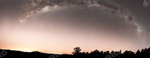 Preview: Mesmerizing view of a shining night's sky glowing with bright colors with galaxies and stars