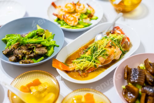 Preview: Chinese family dinner together with asian cuisine food