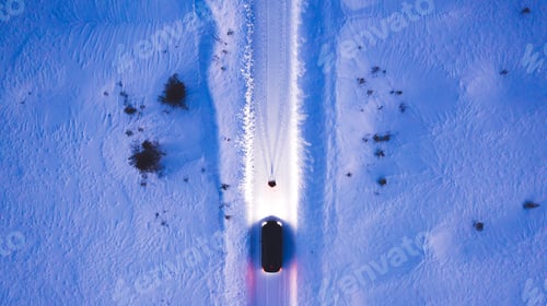 Preview: Person standing front automobile which lighting the way