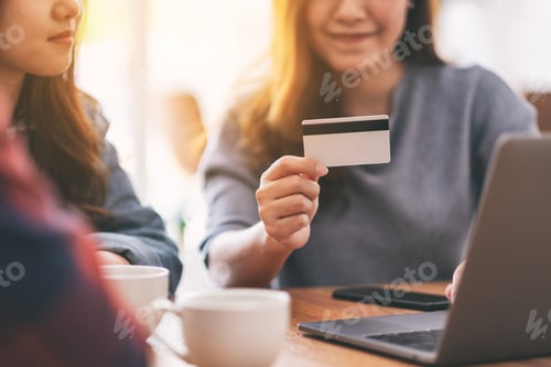 Preview: Three young asian people use credit card to purchasing and shopping online