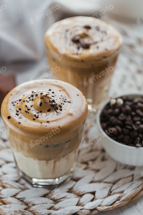 Preview: Glass of Iced Dalgona Coffee, trendy fluffy creamy whipped coffee and milk