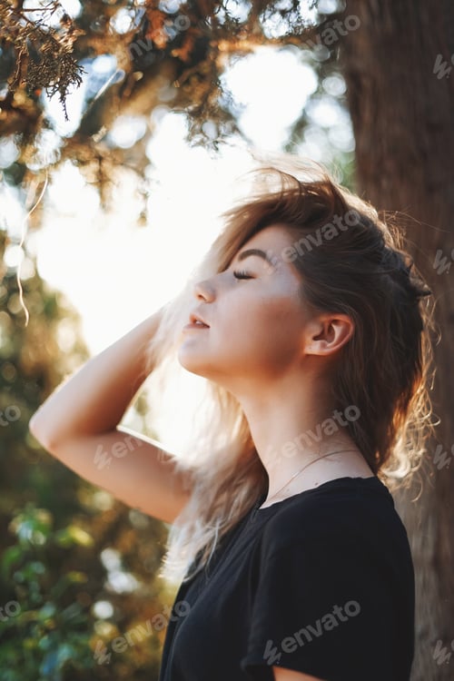 Preview: Portrait of woman with autumn trees background