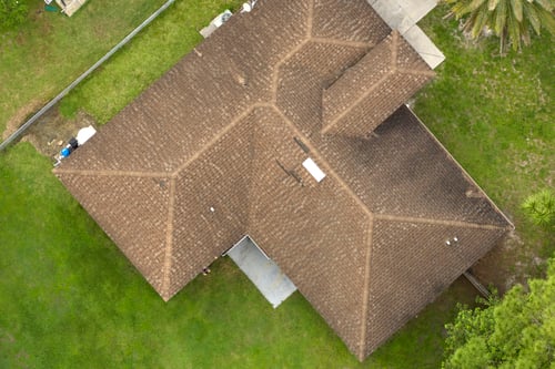Aerial view of typical contemporary american private house with roof top Aerial view of typical contemporary american private house with roof top