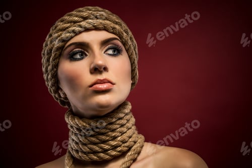 Preview: Portrait of a beautiful young woman with ropes