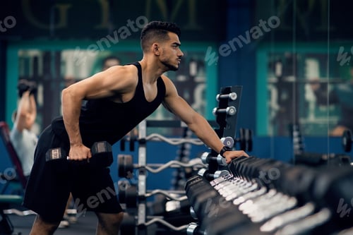 Preview: Sport Training. Confident Muscular Arab Guy Lifting Heavy Barbell At Gym