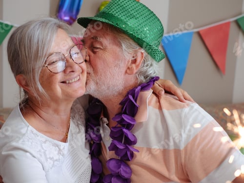 Preview: A tender kiss between two elderly people celebrating their birthday, a moment of full joy