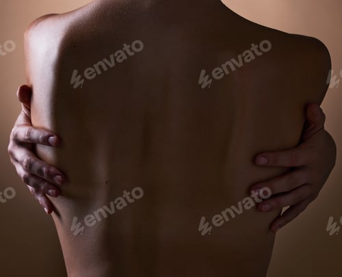 Preview: Woman, back and hands touching body on brown background in studio for creative aesthetic, art deco