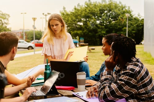 Preview: young man and women studying together