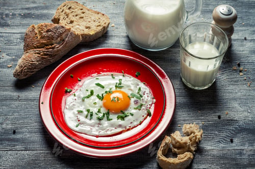 Preview: Country style breakfast made up of eggs and bread