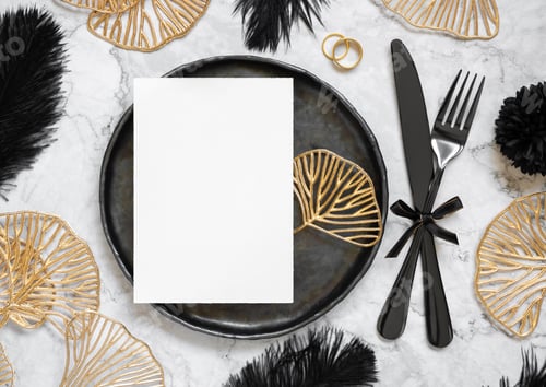 Preview: Black and golden wedding table setting with a blank card and rings top view, mockup