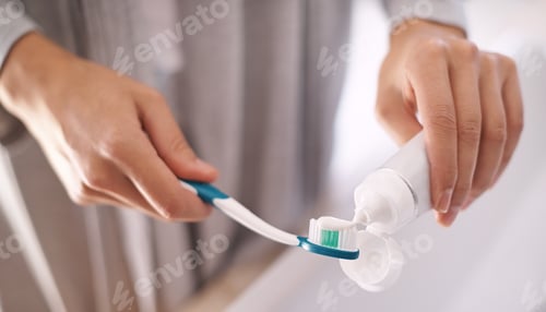 Preview: I brush three times a day. Portrait of an attractive young woman brushing her teeth.