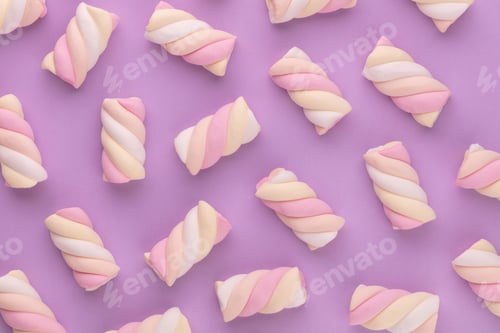 Preview: Colorful marshmallow laid out on pastel background. Creative textured pattern.