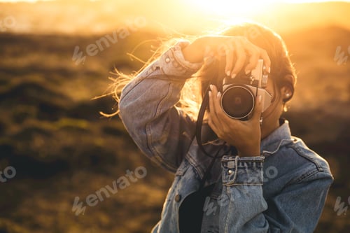 Preview: Woman Taking Picture Outdoors