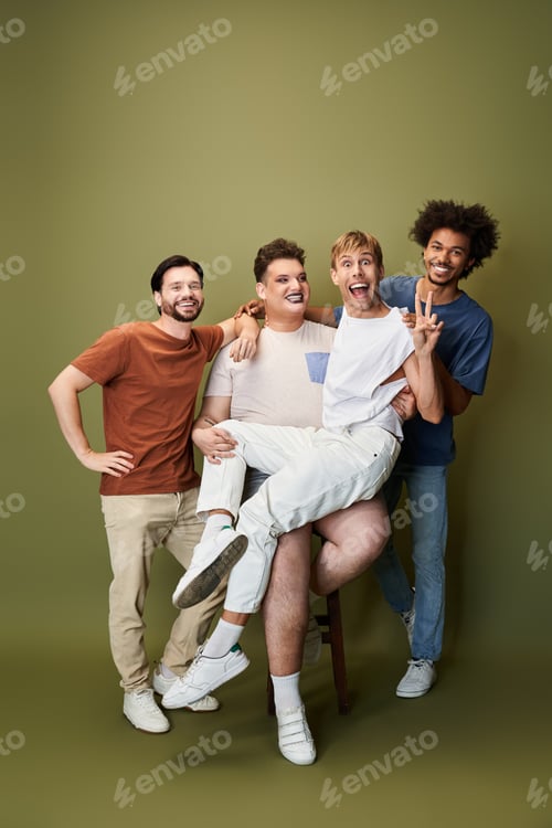 Preview: Group of four friends joyfully celebrating their vibrant queer identity in a studio setting
