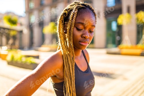 Preview: latin hispanic girl with long yellow dreadlocks pigtails working out outdoor