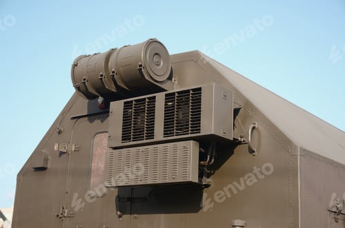 Preview: Close up of green military truck. Modern military transportation