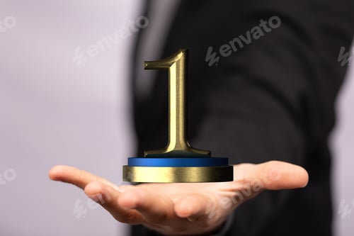 Preview: 3D rendered number 1 presented to a businessman for one year or first place digital award