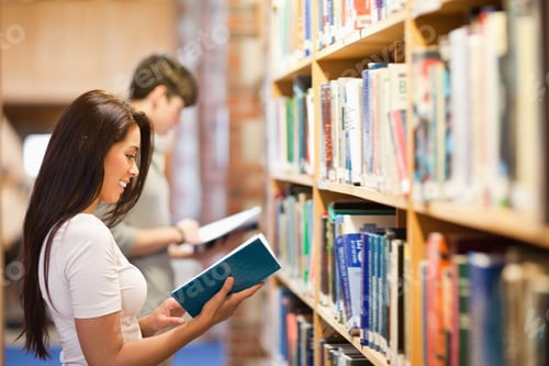 Preview: Students Reading While Standing Up In A Library