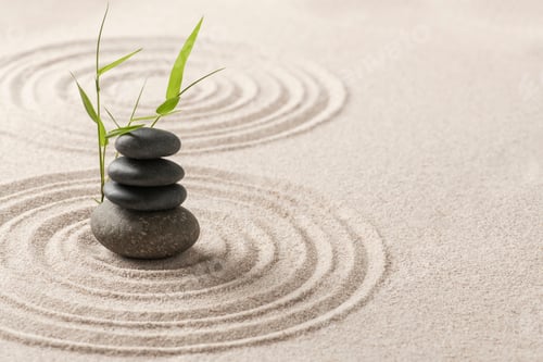 Preview: Stacked zen stones sand background art of balance concept