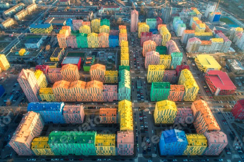 Preview: Aerial view of the colorful buildings in european city at sunset