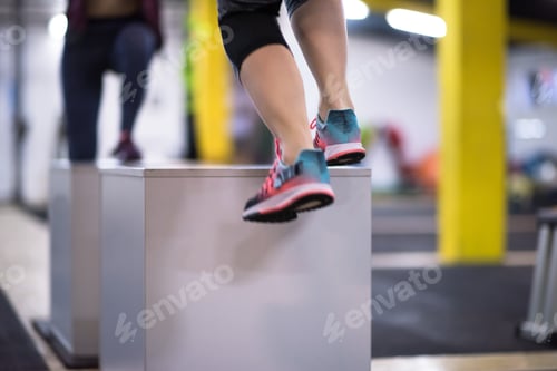 Preview: athletes working out jumping on fit box