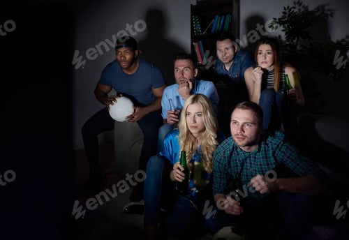 Preview: Friends watching match in silence