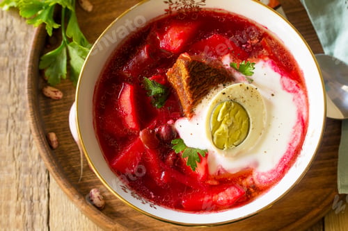 Preview: Traditional Ukrainian Russian borscht. Borsch, beetroot soup with sour ceam.