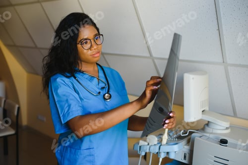 Preview: attractive female african american medical professional in office