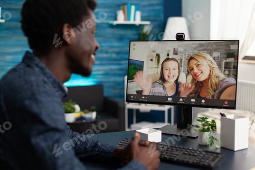 Preview: Black man talking with friends and family on video call
