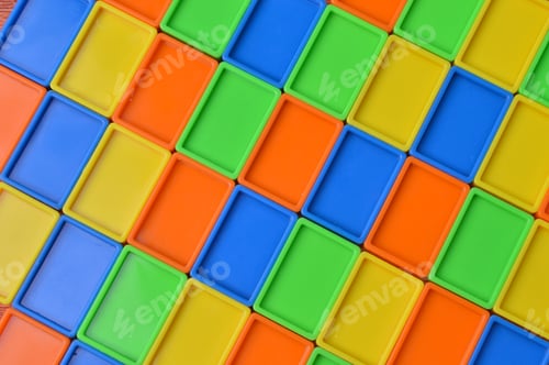 Preview: Colorful plastic toy building blocks. Game structure for development.