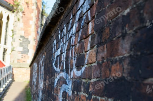 Preview: Manchester, UK - 10 May 2017: Graffiti On Wall In Manchester Street