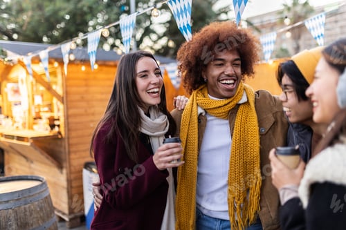 Preview: Multiracial young group of friends having fun together on winter holidays