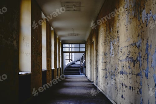 Preview: Corridor with damaged dirty walls leading to the stairs.