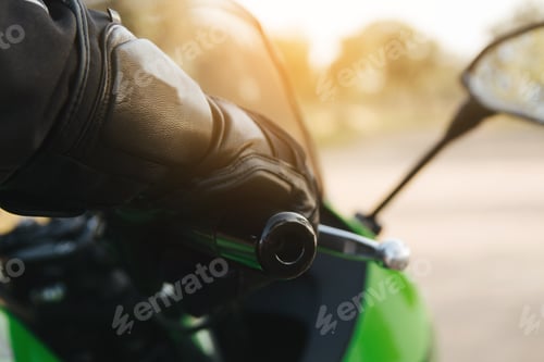 Preview: rider with your hand on the throttle or brake on the handlebar of your motorcycle