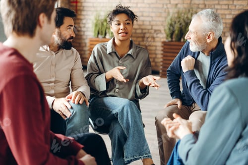 Preview: Patients listening to doctor during group therapy session