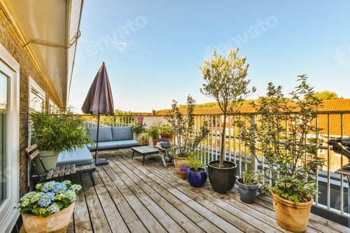Preview: Bright balcony with chair and door